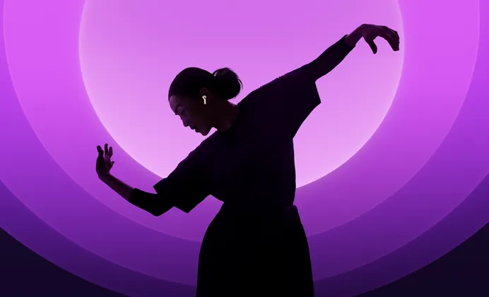 Tańcząca osoba z AirPods 5 w uszach na kolorowym tle