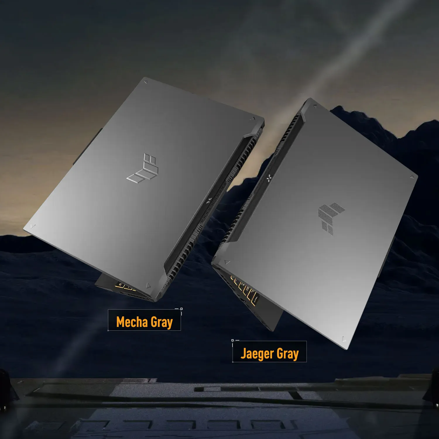 Dwa laptopy ASUS TUF w widoku z góry, pokazujące różne wersje kolorystyczne obudowy: Mecha Gray i Jaeger Gray, oba z logo TUF na pokrywie.