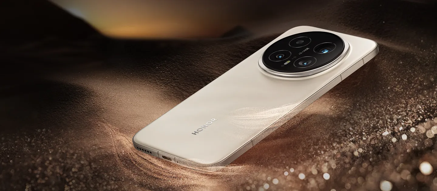 Złoty smartfon na tle z połyskującymi drobinkami złota