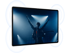 Na ekranie tabletu Huawei MatePad Air widok muzyka na scenie z uniesionymi rękoma i smugami świateł za nim