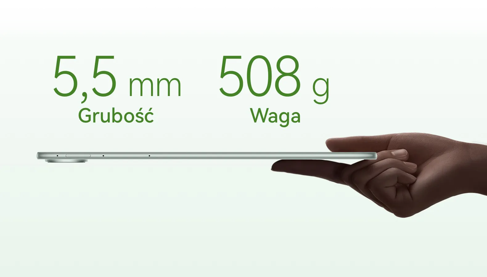 Tablet trzymany na dłoni z profilu, bardzo cienki. Tekst na grafice: 5,5 mm grubość, 508 g waga.