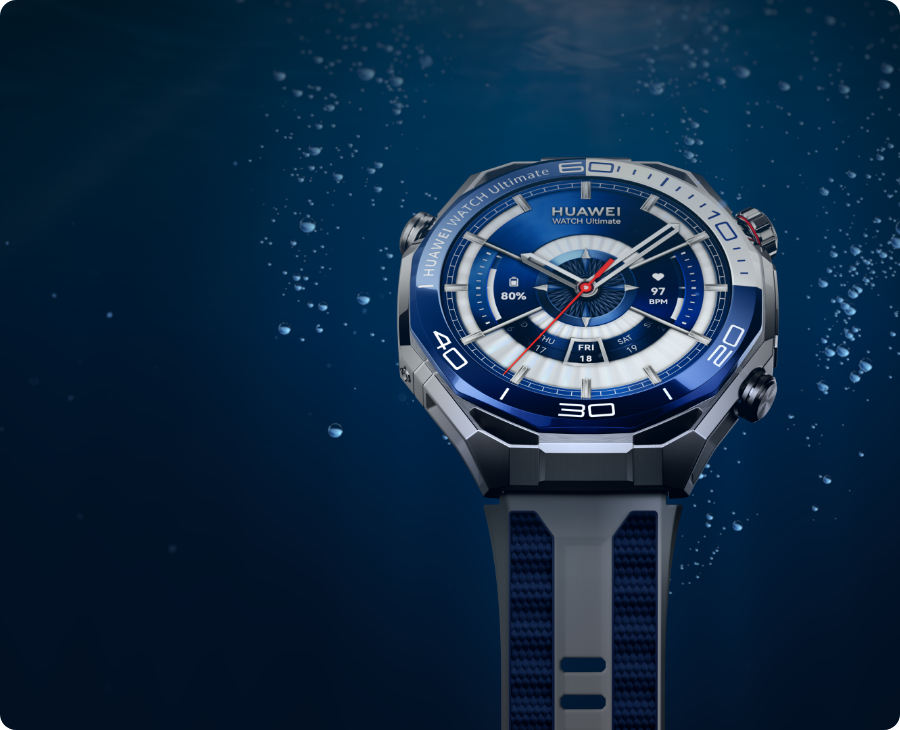 Smartwatch HUAWEI Watch Ultimate 2 w srebrno-niebieskiej kopercie z niebieskim paskiem, zaprezentowany pod wodą, z widocznymi bąbelkami powietrza w tle.
