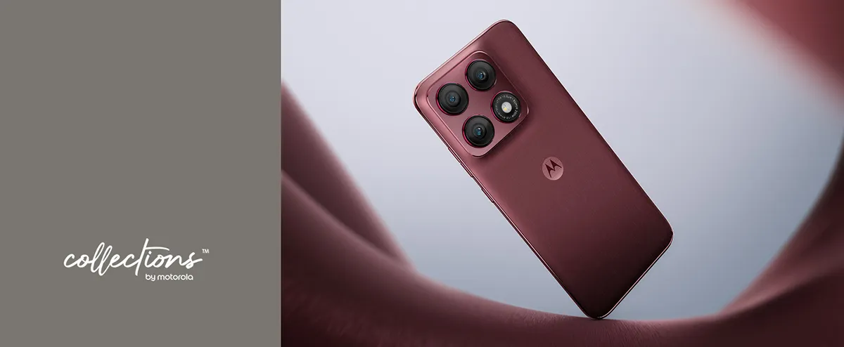 ciemnoróżowa motorola na tle lejącego materiału