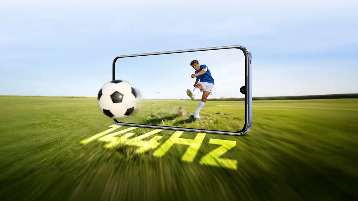 Telefon na tle boiska pokazujący kolorowy wyświetlacz o odświeżeniu 144 Hz