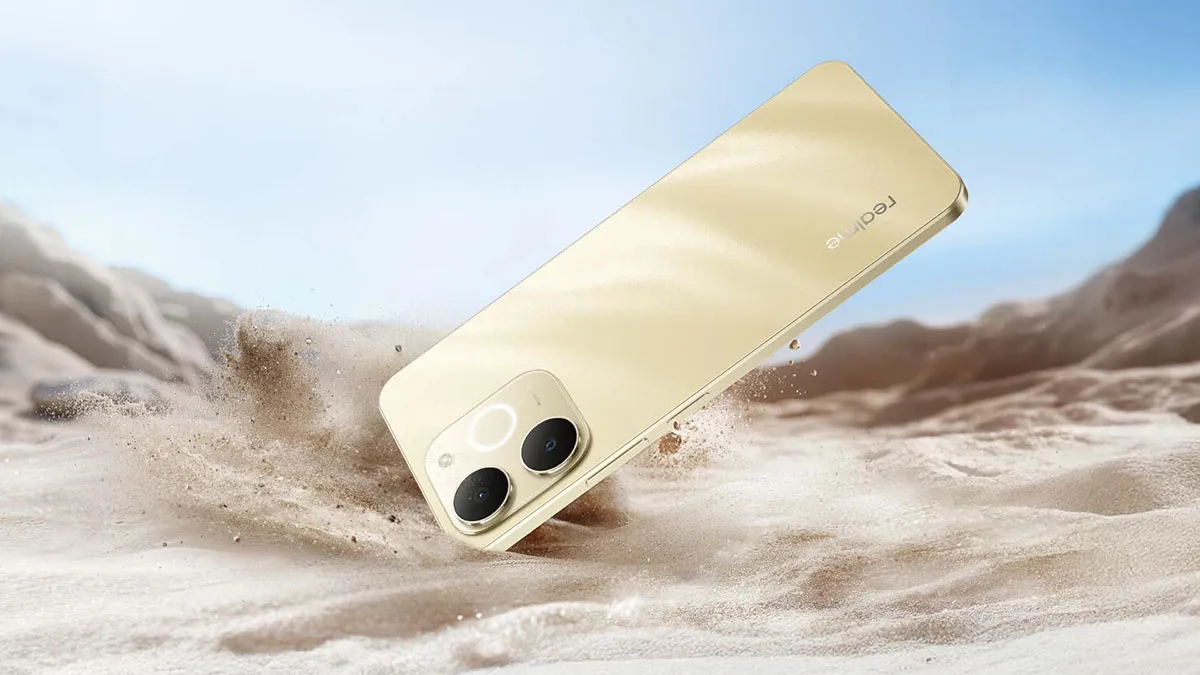 Złoty smartfon Note70T uderzający brzegiem ekranu o ziemię