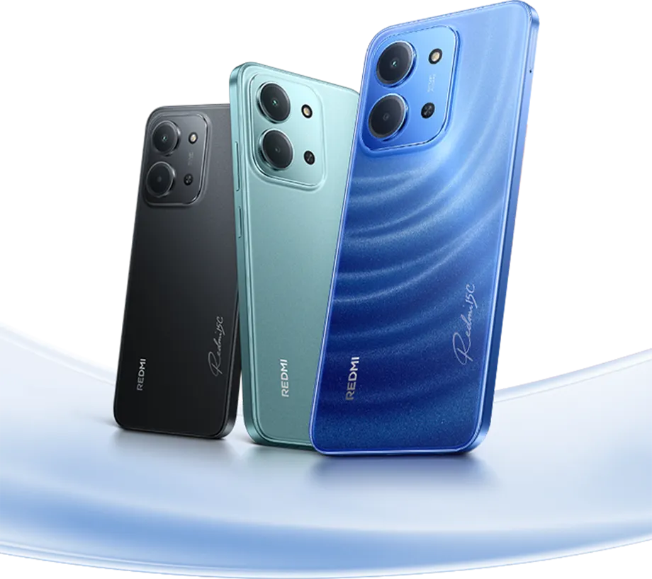 Smartfony Redmi 5G w trzech kolorach (czarny, zielony i niebieski), widoczne trzy tylne aparaty fotograficzne.
