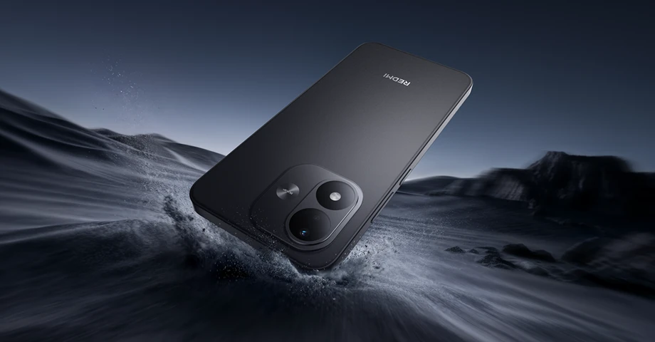 Czarny REDMI Note 17 5G unoszący się nad skalistym podłożem w dynamicznej scenerii