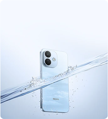 Jasnoniebieski smartfon REDMI częściowo zanurzony w wodzie