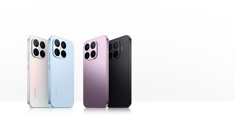 Smartfony Xiaomi w czterech wersjach kolorystycznych ustawione na ciemnym tle