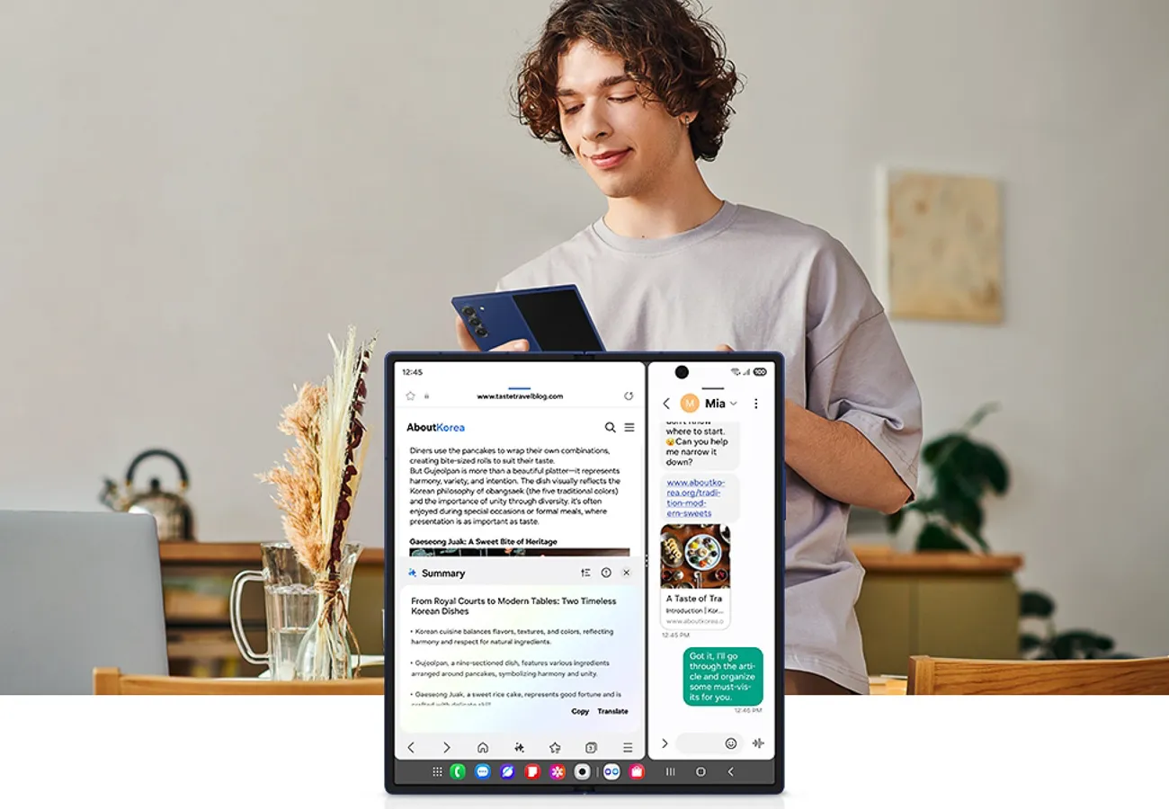 Mężczyzna korzysta z tabletu z otwartą stroną internetową i panelem Galaxy AI pokazującym streszczenie treści.